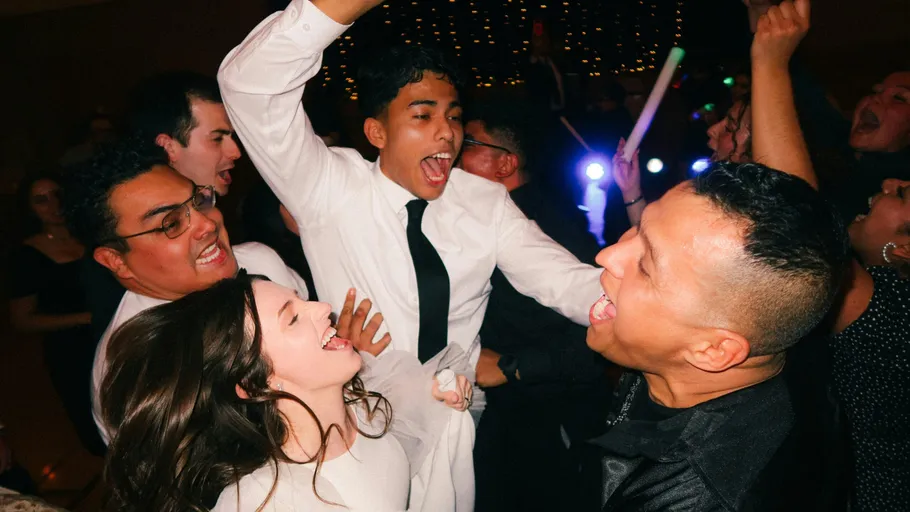 People dancing and celebrating at a party.