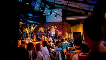 People in a lively bar setting.