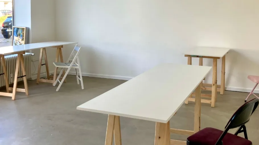 Empty room with tables and chairs.
