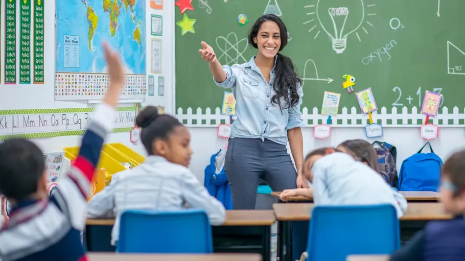 Teacher engaging students in classroom.