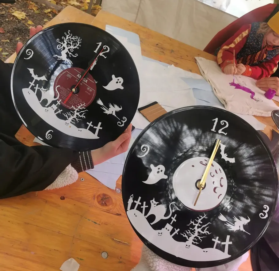 Vinyl records transformed into Halloween-themed clocks.