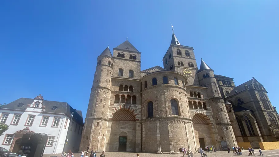 Large cathedral building with blue sky background.