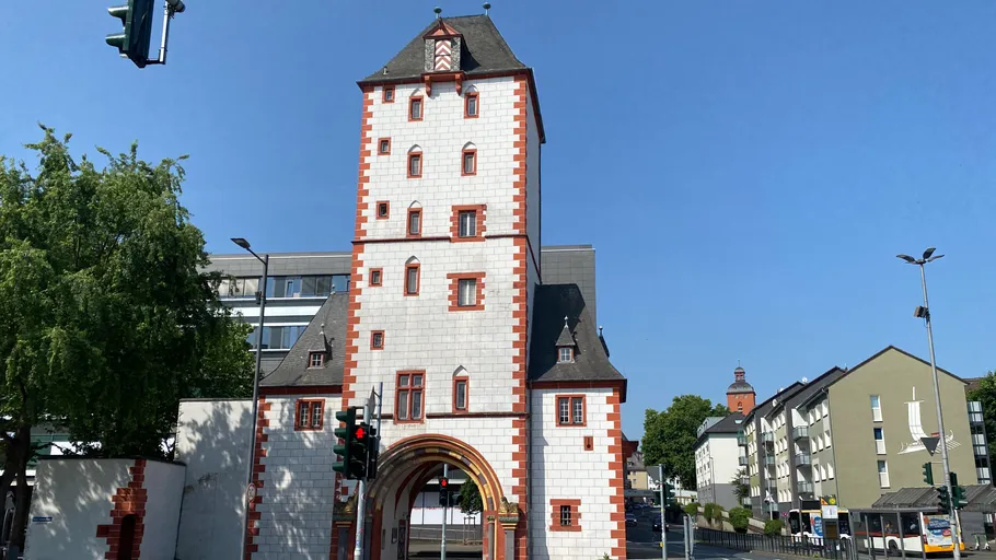 Historic city gate tower under clear sky.