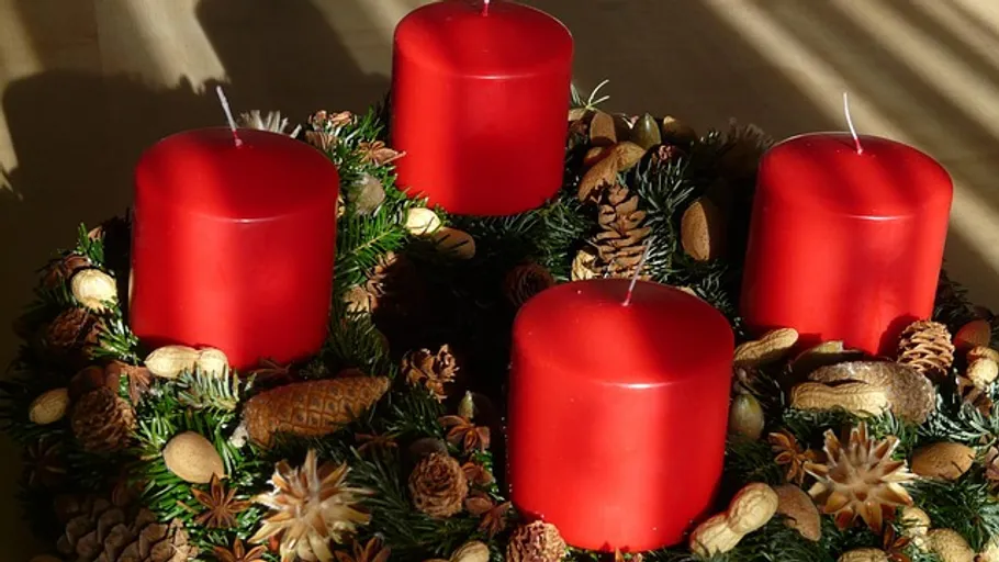 Red candles on an Advent wreath.